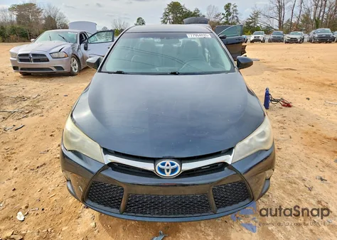 2015 Toyota Camry Hybrid z USA, uszkodzony, nr VIN 4T1BD1FK0FU161005